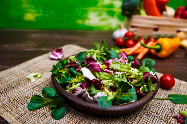 istock Endive, lamb and rose salad. Vegetables. 665410348