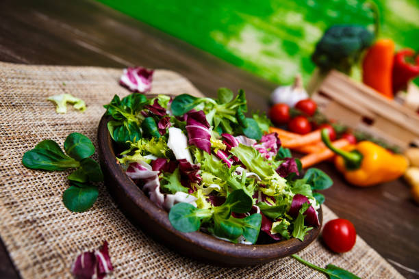 istock Endive, lamb and rose salad. Vegetables. 665410438