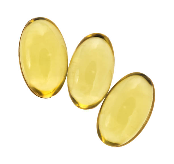 istock Vitamin a capsules on a white background 665410856