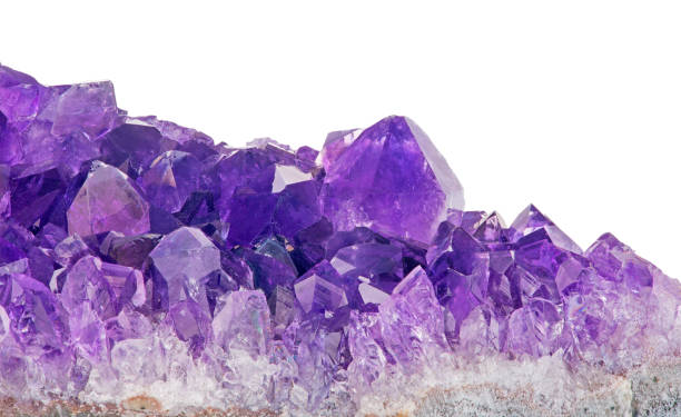 istock lilac amethyst crystals close-up on white 665410948