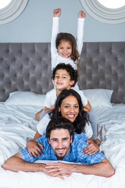 istock Happy family posing for camera 665411004