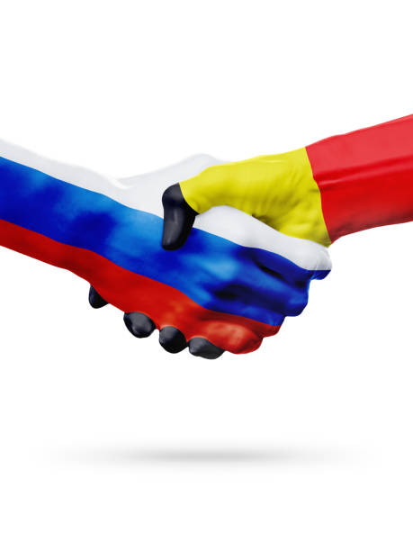 istock Flags Russia, Belgium countries, partnership friendship handshake concept. 665411228