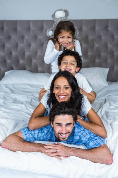 istock Happy family posing for camera 665411314