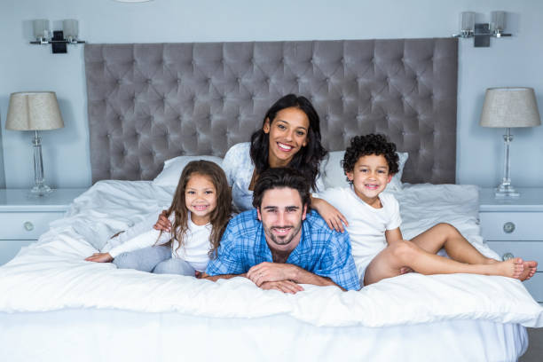 istock Happy family posing for camera 665411558