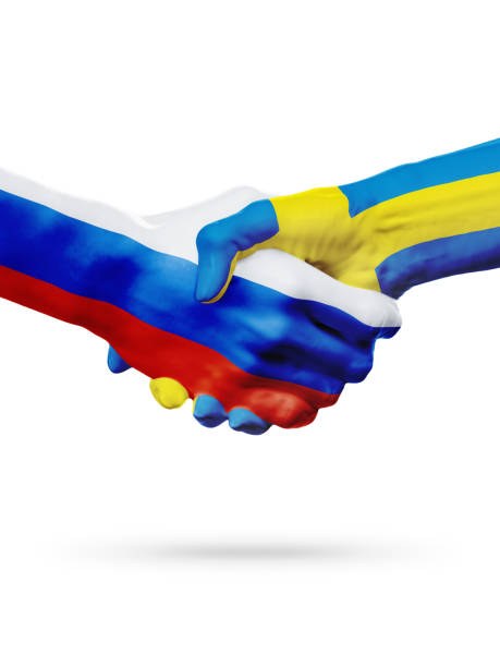 istock Flags Russia, Sweden countries, partnership friendship handshake concept. 665411624