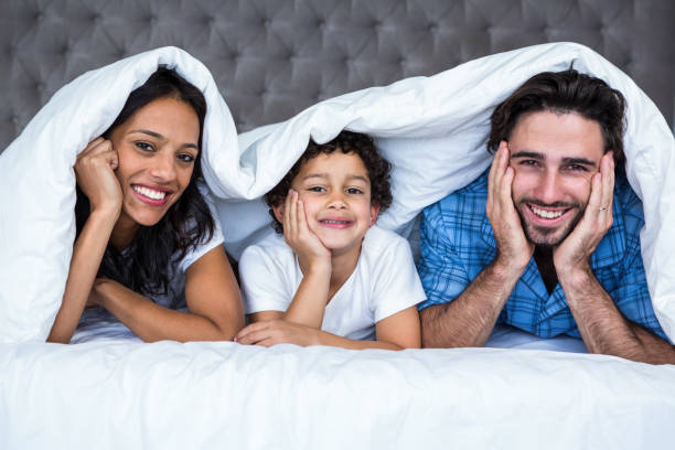 istock Happy family posing for camera 665414294