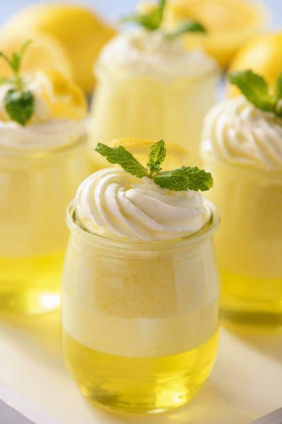 istock Lemon pudding with jelly on wooden background. 665418406