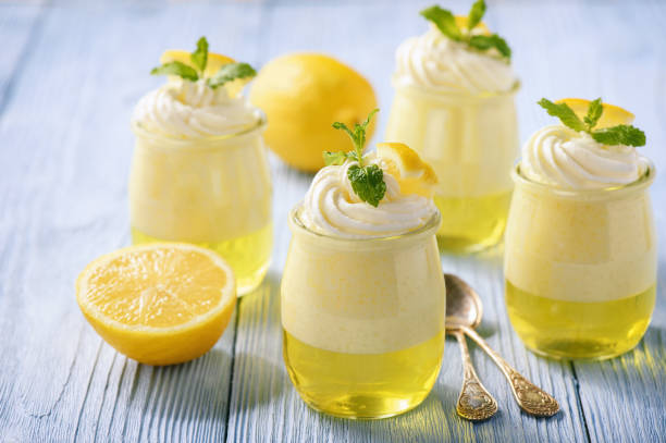 istock Lemon pudding with jelly on wooden background. 665418416