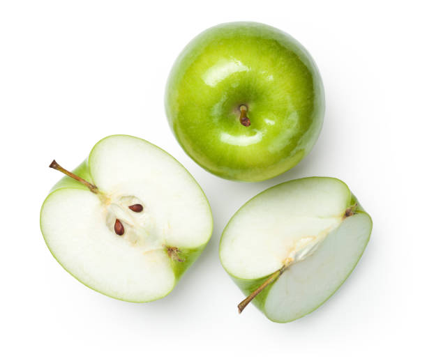 Granny Smith Apples on White Fresh granny smith apples on white background. Top view green apple slice stock pictures, royalty-free photos & images