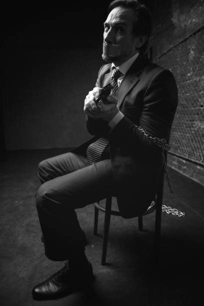istock Furious captivated businessman defending himself 665431144