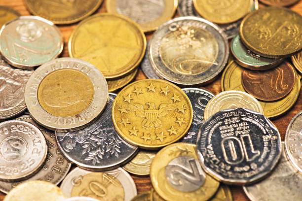 istock top view and close up of different coins background 665431980