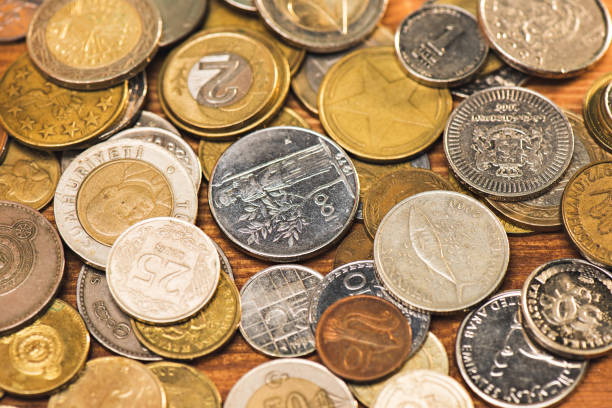 istock top view and close up of different coins background 665432662