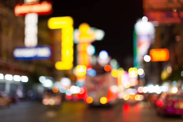 istock Blurred traffic lights bokeh background in China Town 665436756