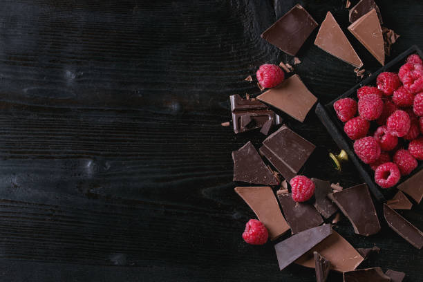 istock Variety of chopping chocolate with raspberries 665439114