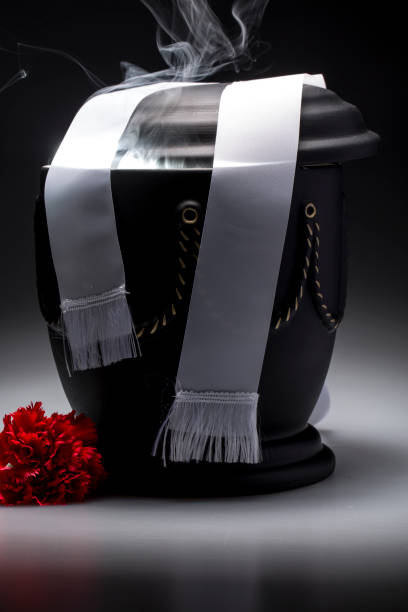 istock funeral mourning urn, for obituary 665445160