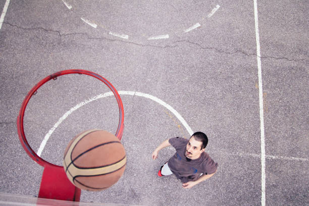 istock Basketball player outdoor practicing. Street ball. 665448948