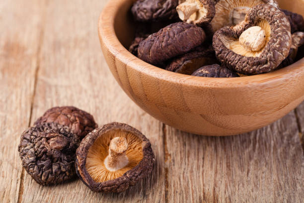 istock dried shitake mushroom on a wooden table 665466140