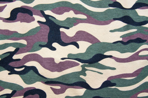istock Texture of soldier camouflage fabric 665477032