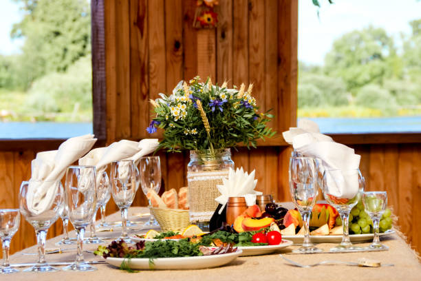istock very nicely decorated wedding table with plates and serviettes. 665486462