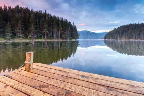 istock Wooden platform by a lake 665486800