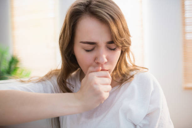 istock Pretty woman coughing 665493796