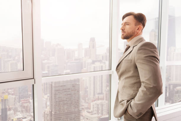 istock Thoughtful serious businessman working in the office 665494044