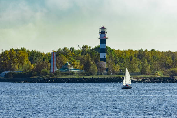 istock Small sailboat traveling 665503366