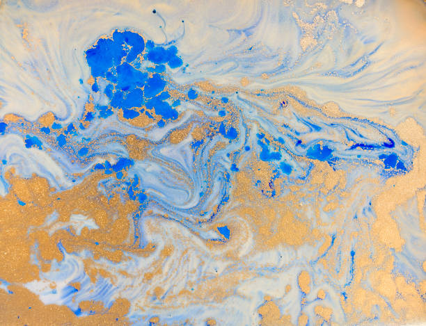 istock Blue and golden liquid texture. Watercolor hand drawn marbling illustration. Ink marble background. 665524718