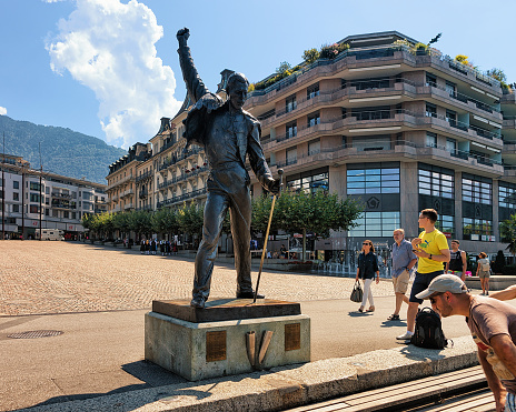 Montreux, Switzerland - August 27, 2016: People at Freddie Mercury statue at Geneva Lake Riviera in Montreux, Vaud canton, Switzerland