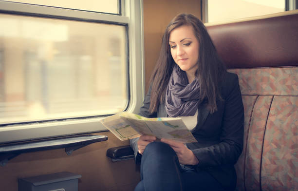 istock Young woman in train 665531858