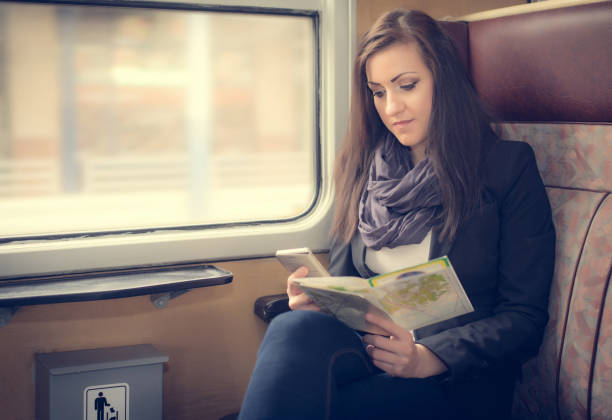 istock Young woman in train 665531902