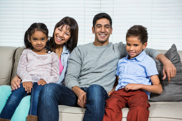 istock Happy family on the sofa 665532504
