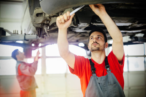 istock Car mechanics working on car maintenance 665544802