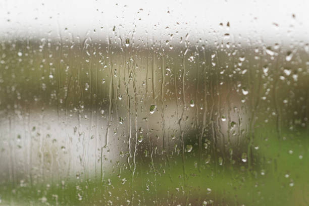 istock Raindrops on glass, spectacular color background 665545178