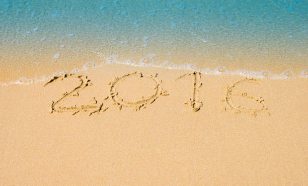 istock Soft wave of blue ocean on sandy beach. Background. 665553400