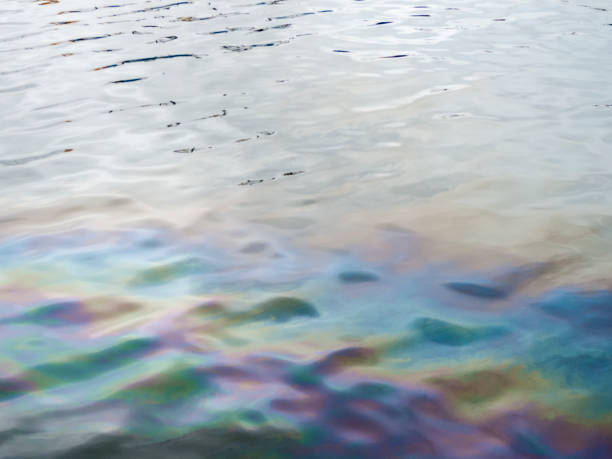 istock Oil slick on water 665555598