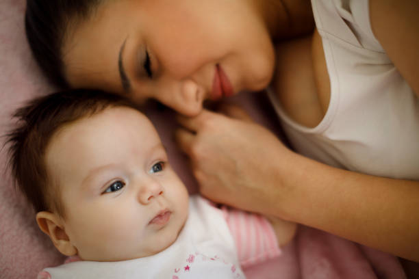 Baby and mother at home