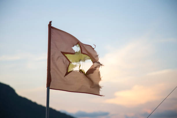 istock Tore Vietnam flag in sunset background 665578382