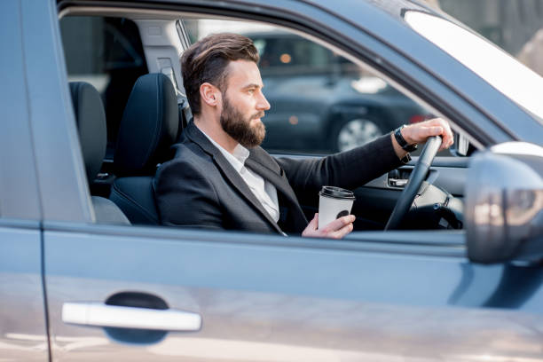 istock Businessman driving a car 665582470