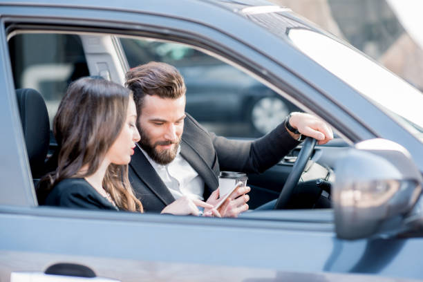 istock Business couple in the car 665582592