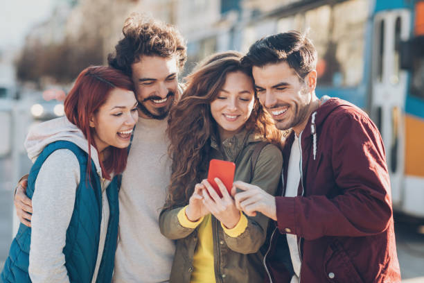 istock Friends with smart phone 665585038