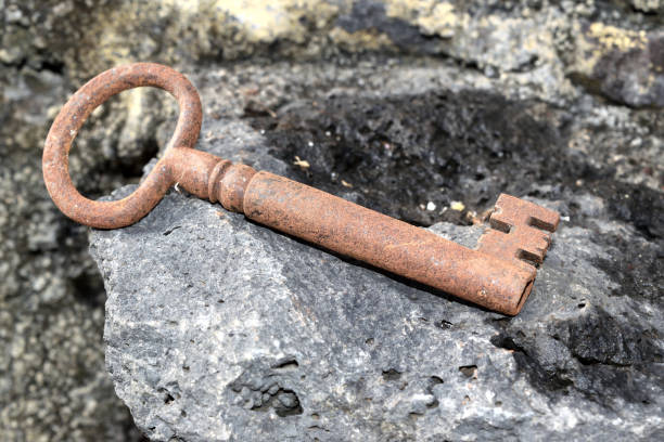 istock very old door key in rusty iron 665585396