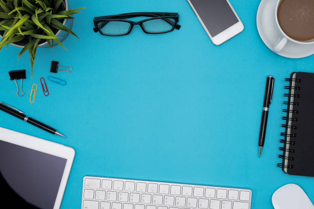 istock Office table desk with supplies and copy space 665586138