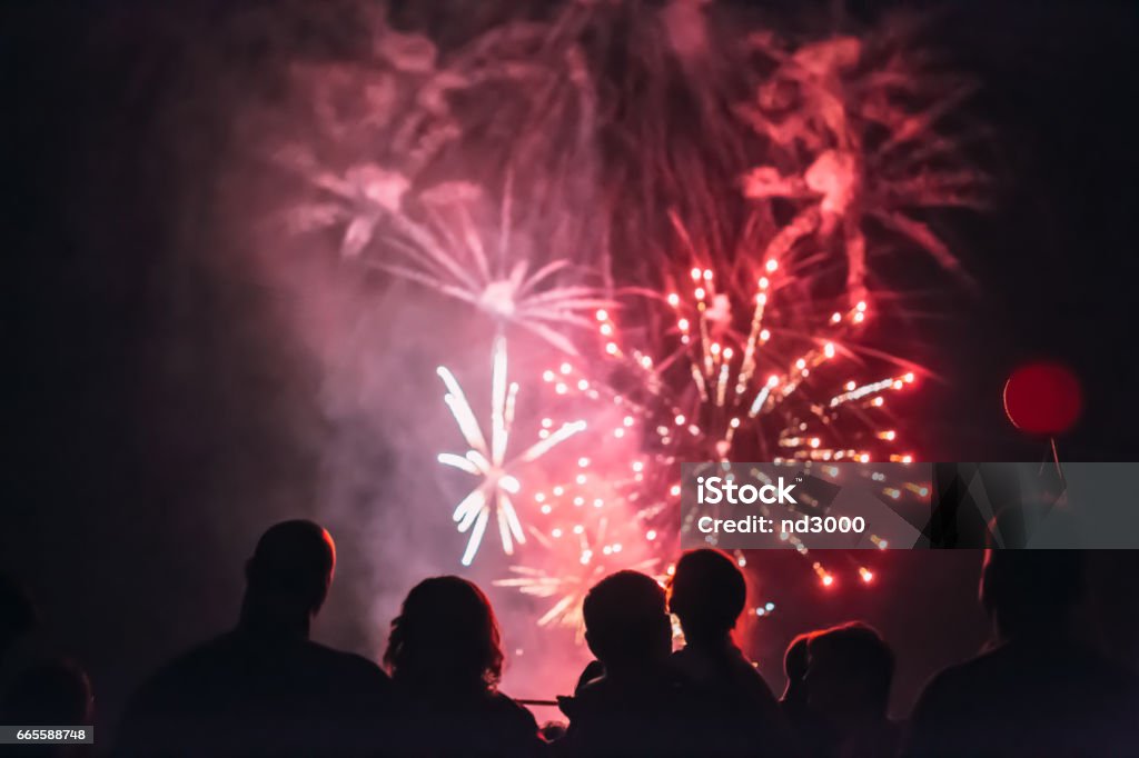 Crowd wathcing fireworks and celebrating Anniversary Stock Photo