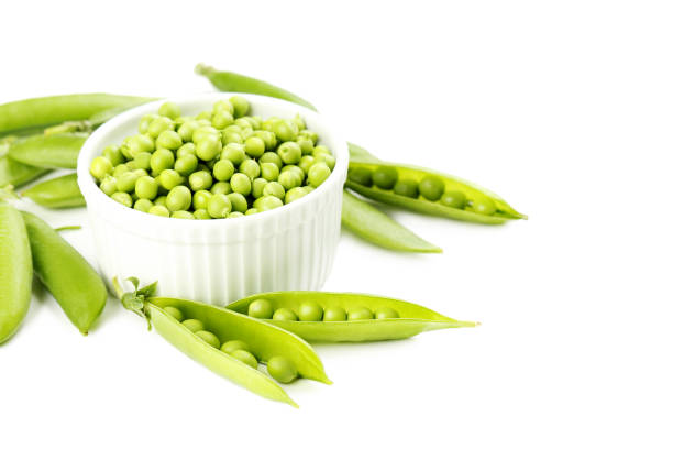 istock Green peas isolated on a white background 665588870