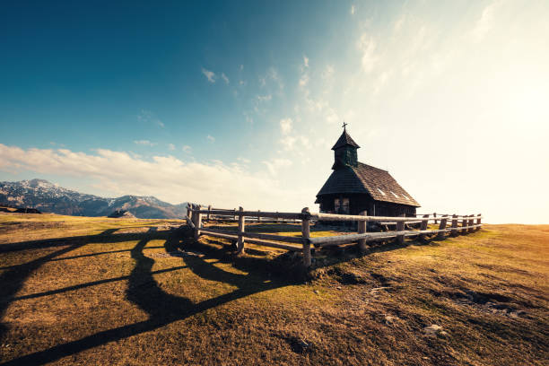 istock Old Wooden Church Droping The Shadow 665589388