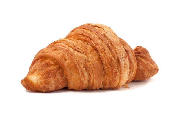 istock Fresh and tasty croissant over isolated white background 665589850