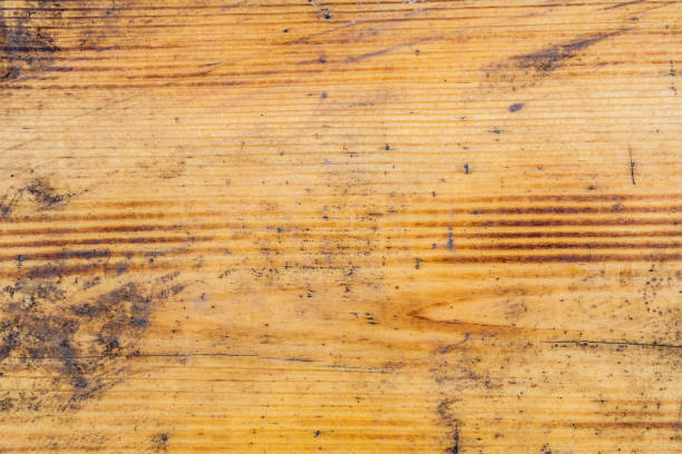 istock old brown wooden varnished texture background 665590094