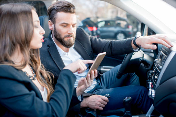 istock Business couple in the car 665592496