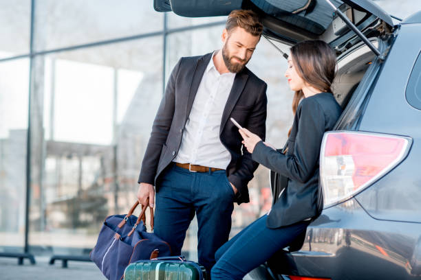istock Business couple traveling by car 665592952